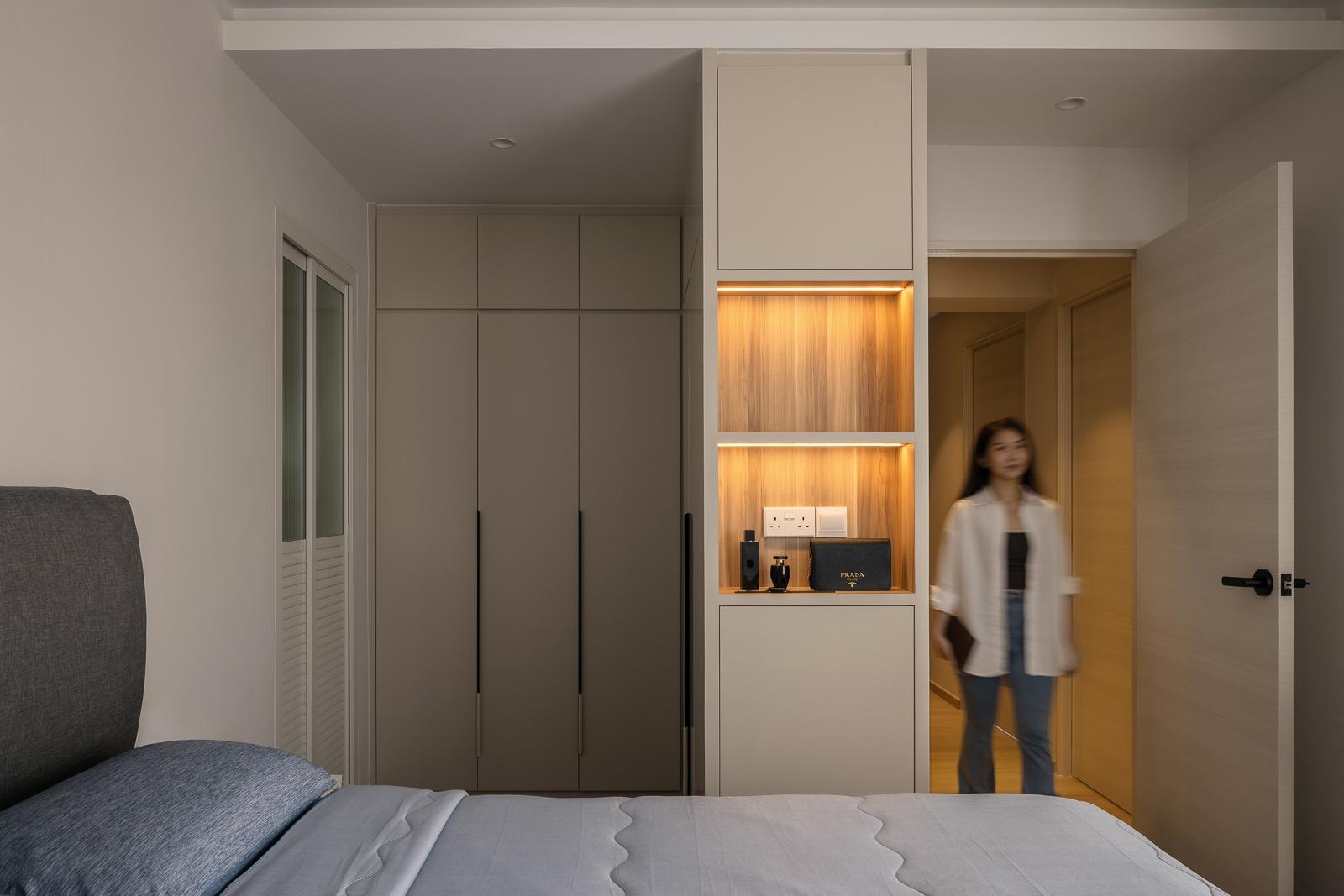 Minimalist Bedroom with Bookshelf and Cove Lighting