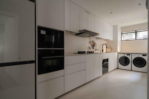 Minimalist Kitchen at Anchorvale Grove