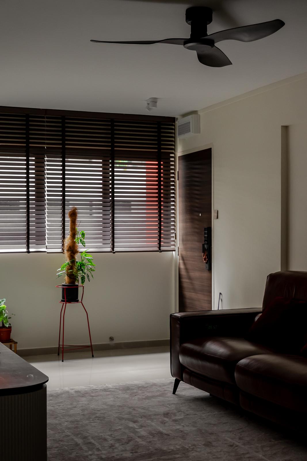 Modern Living Room with Homogeneous Tiles and TV Console