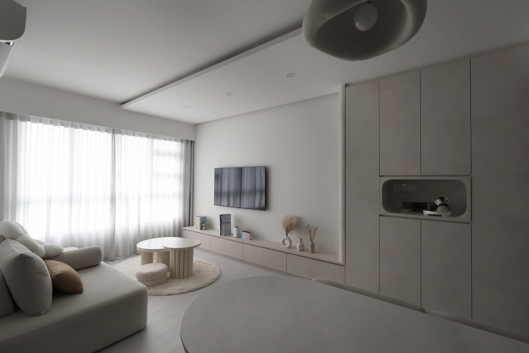 Minimalist Living Room with Cove Lighting and TV