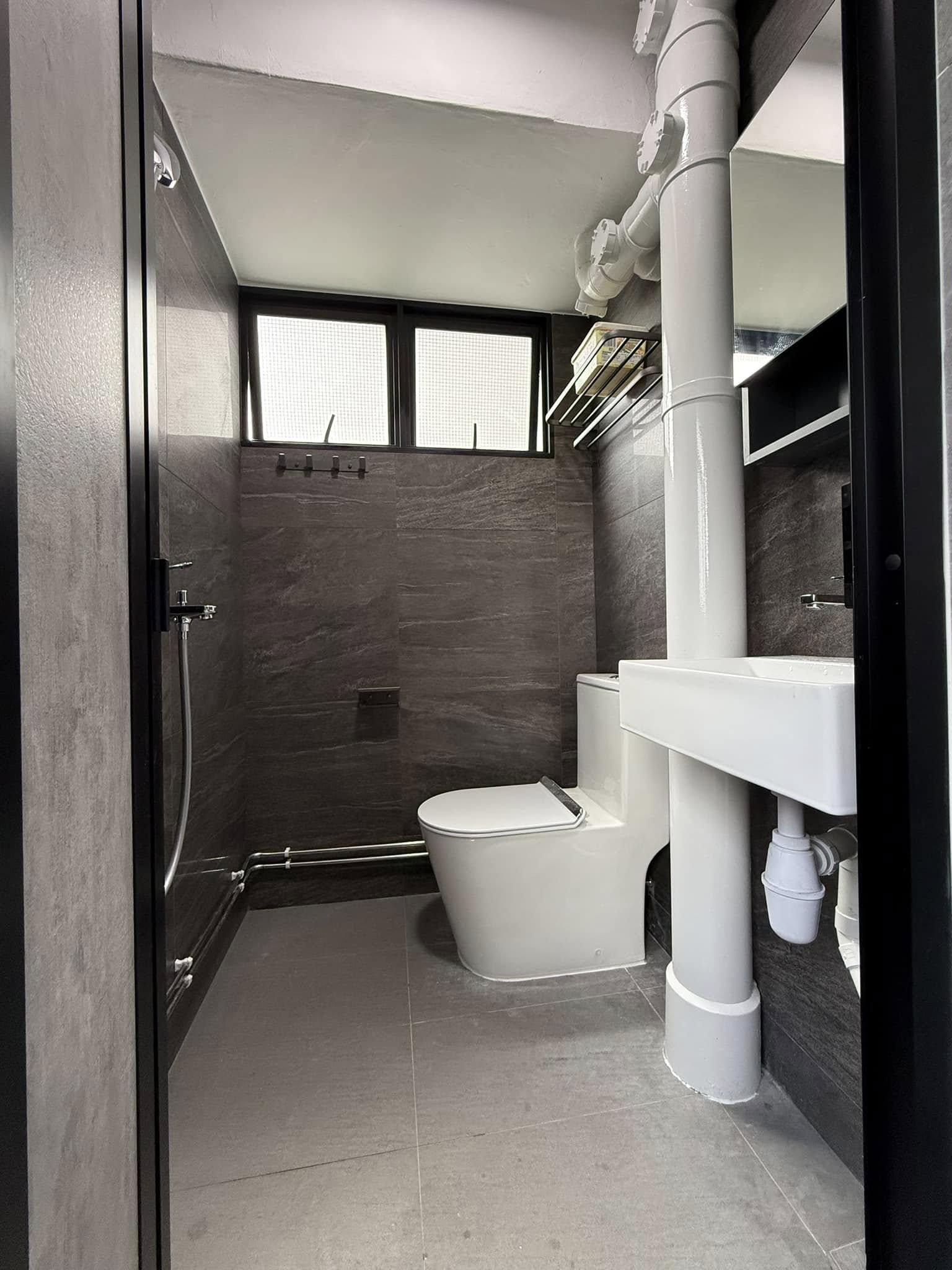 Modern Bathroom with Homogeneous Tiles and Mirror