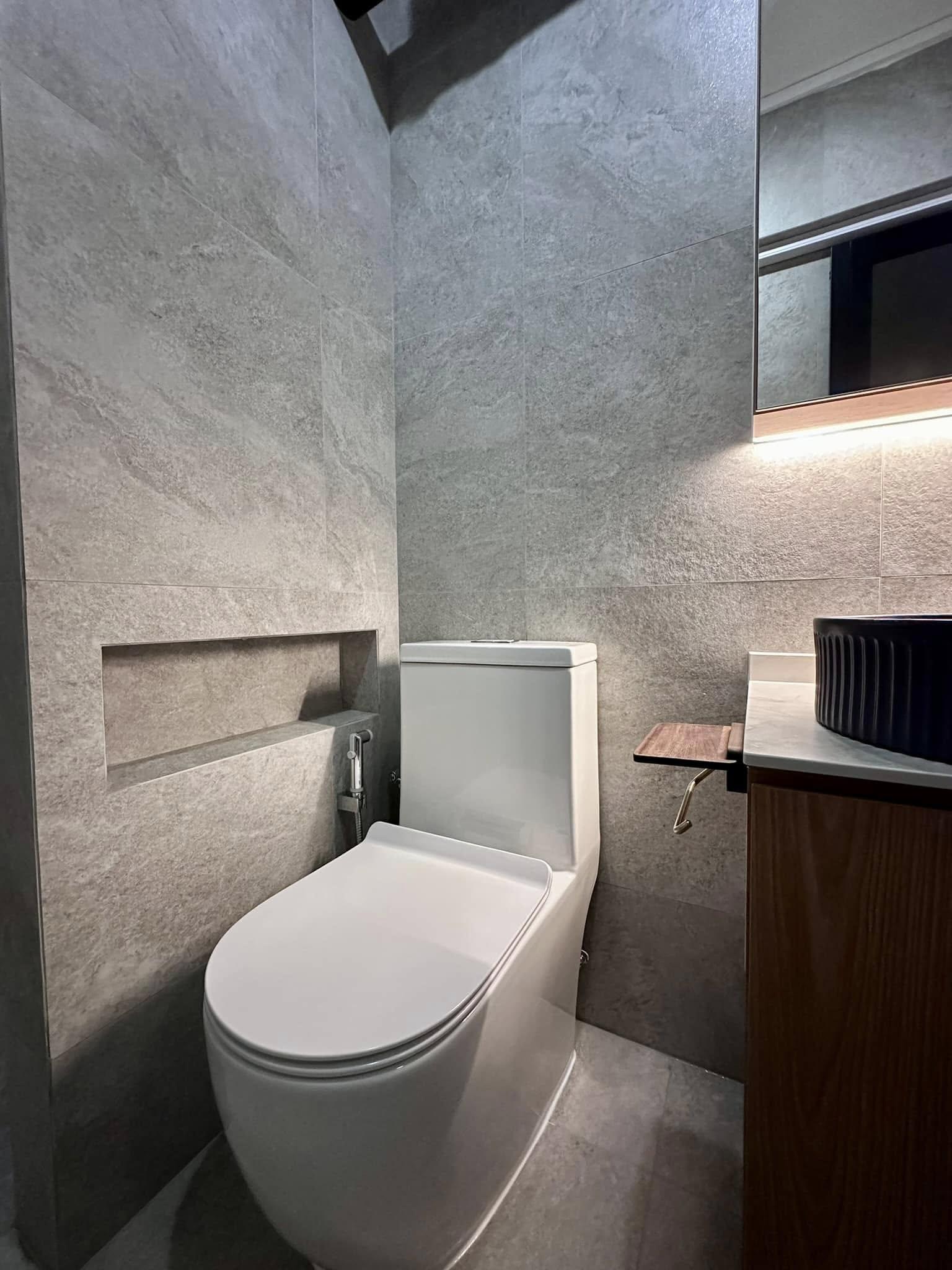 Scandinavian Bathroom with Homogeneous Tiles and Mirror