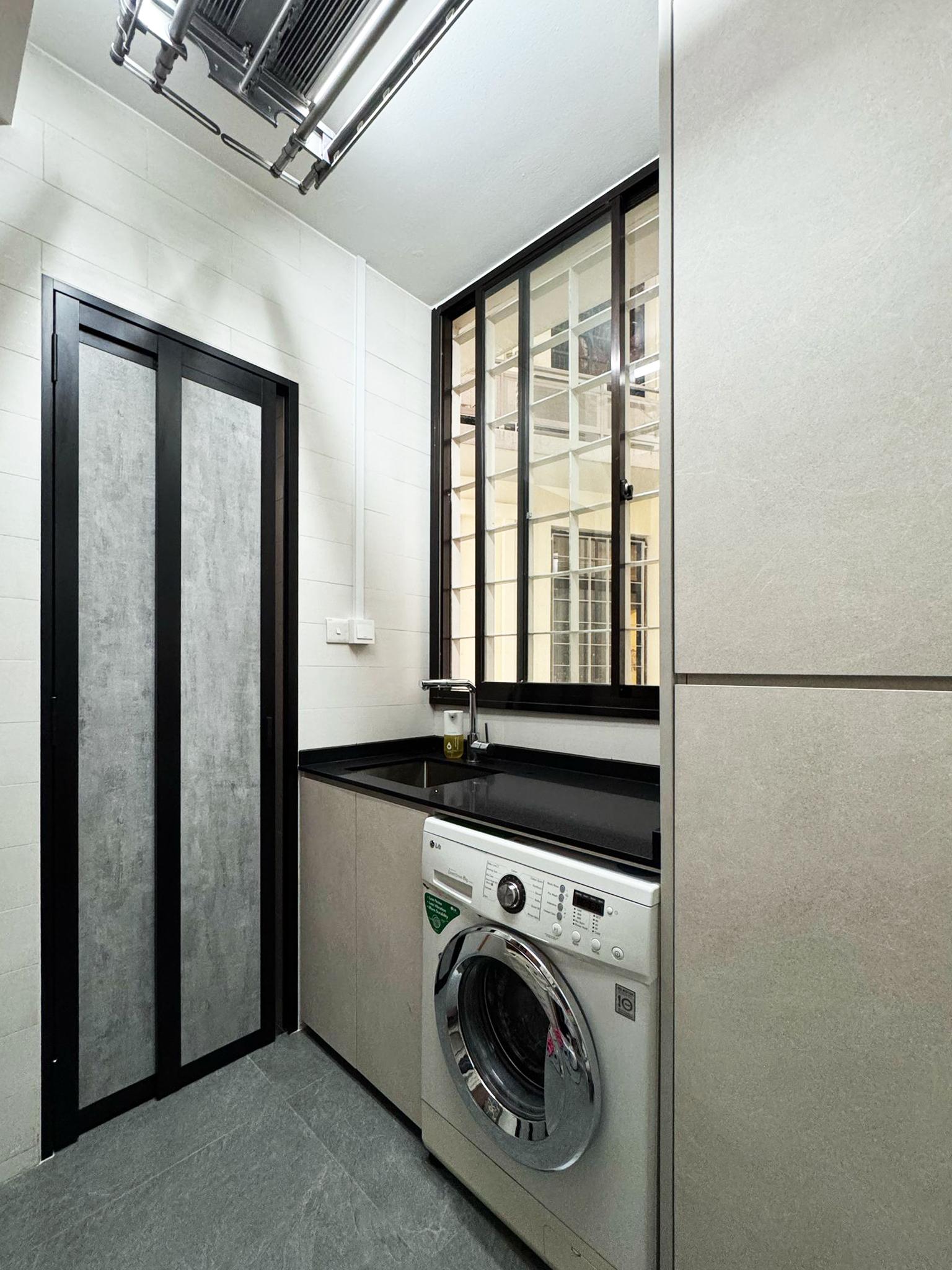 Minimalist Service Yard with Washing Machine and Laundry Area