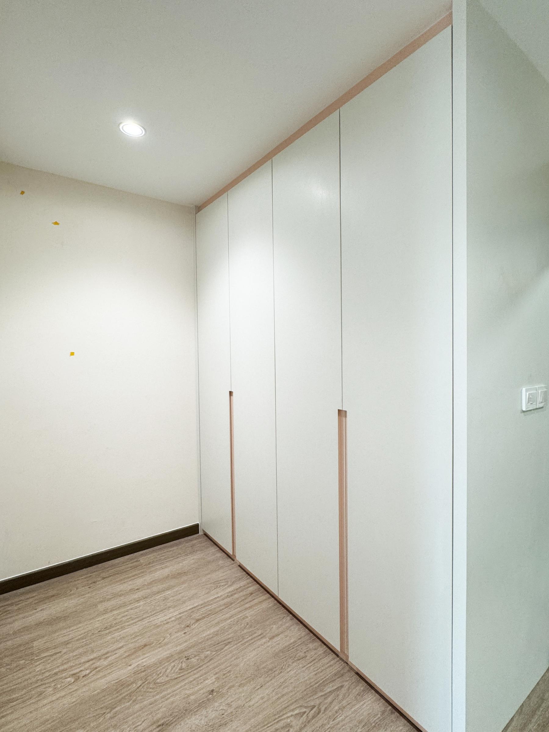 Minimalist Bedroom with Vinyl Flooring and Drop Light