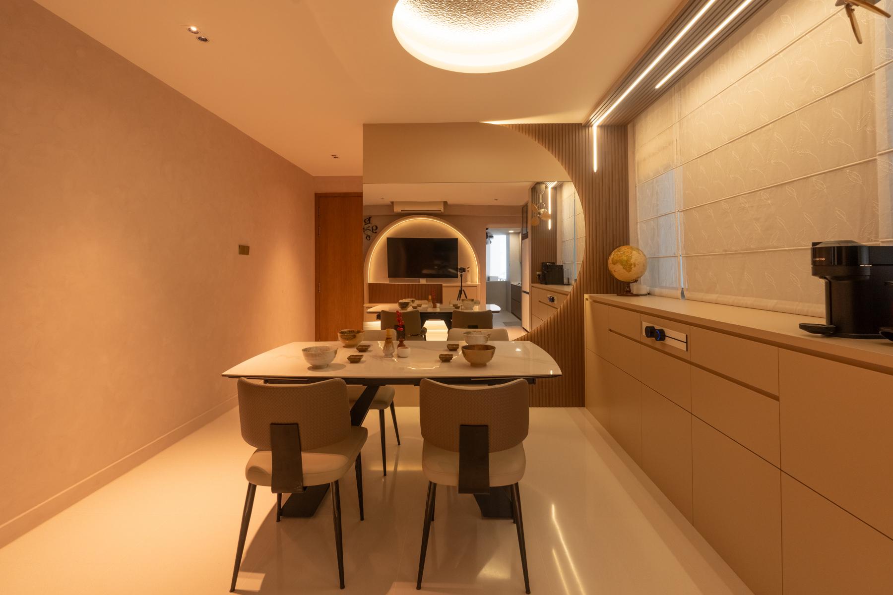 Modern Dining Room with Drop Light and Cove Lighting