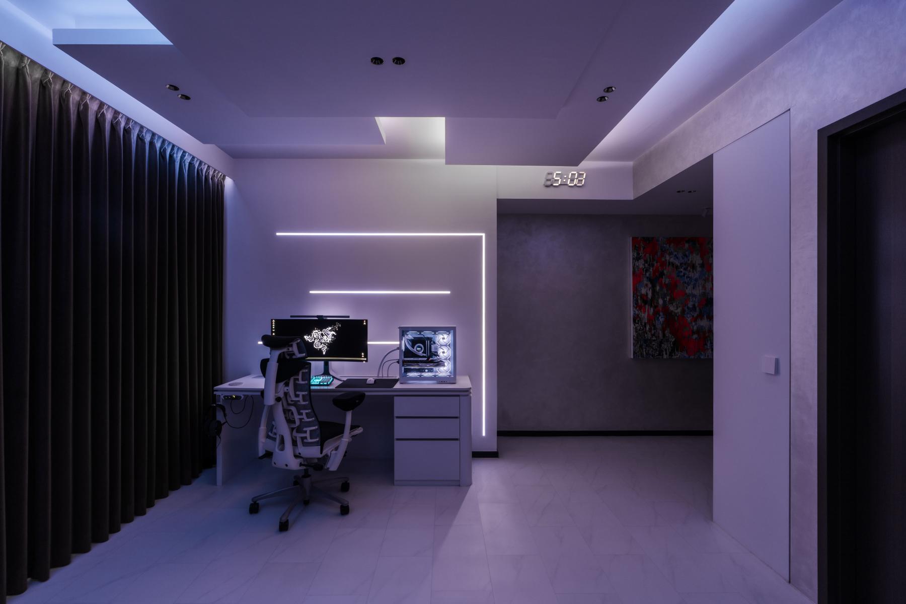 Contemporary Gaming Room with Feature Wall and Cove Lighting
