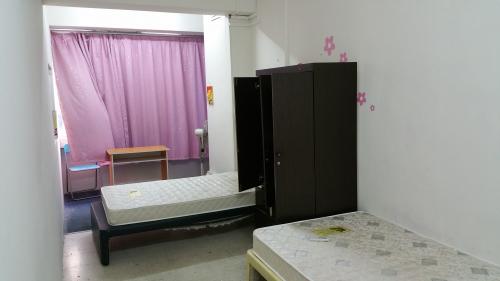 Asian Bedroom at Pearl Centre Apartment #13-04