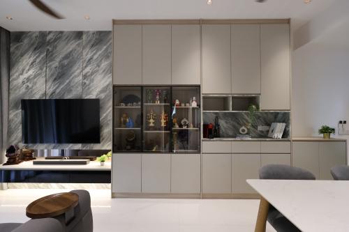 Contemporary Living Room at 3 Bedroom Condo @ Phoenix Residences