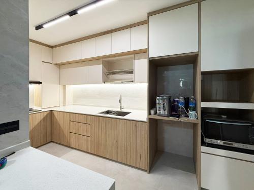 Minimalist Kitchen at Anchorvale Gardens