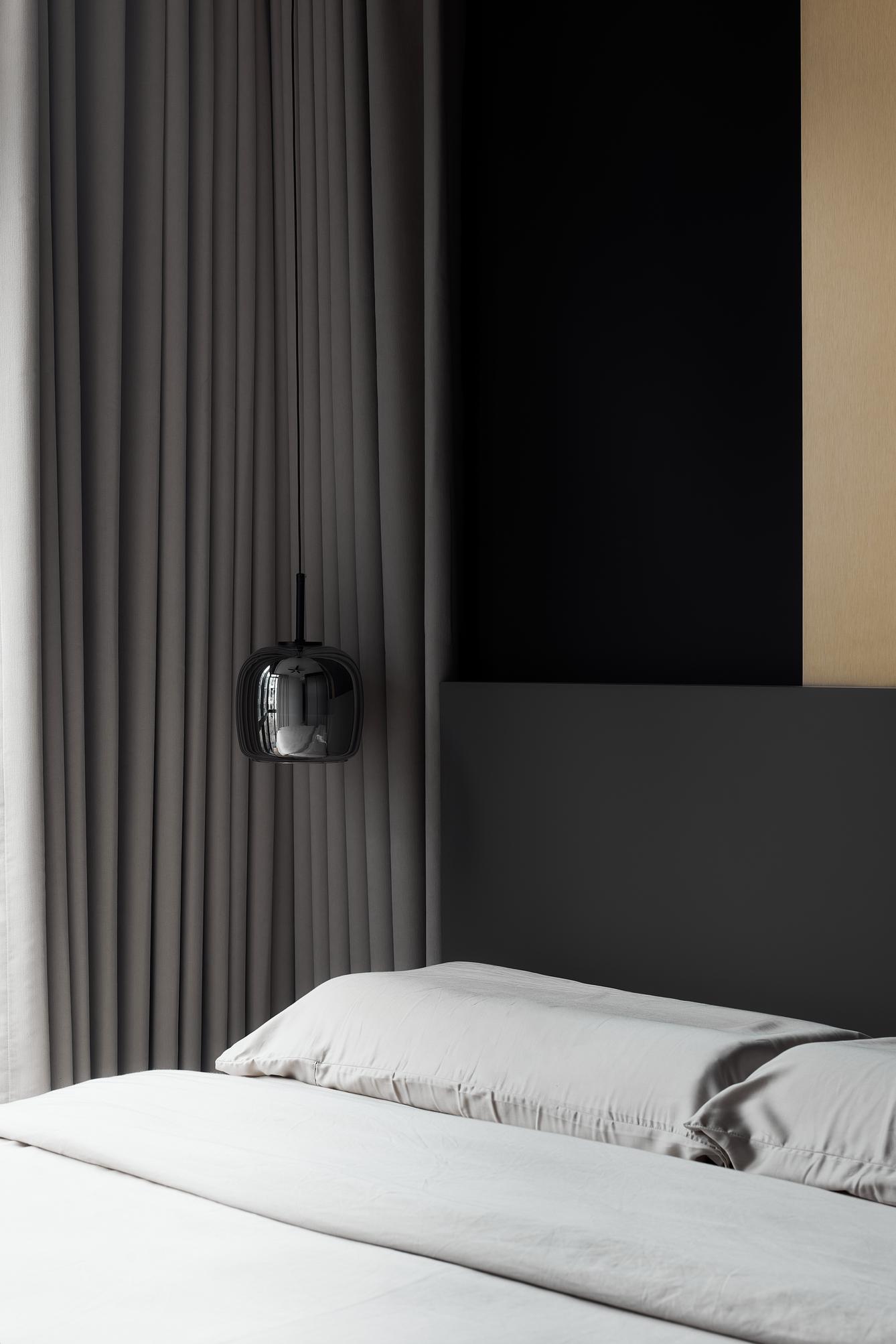 Modern Bedroom with Feature Wall and Drop Light