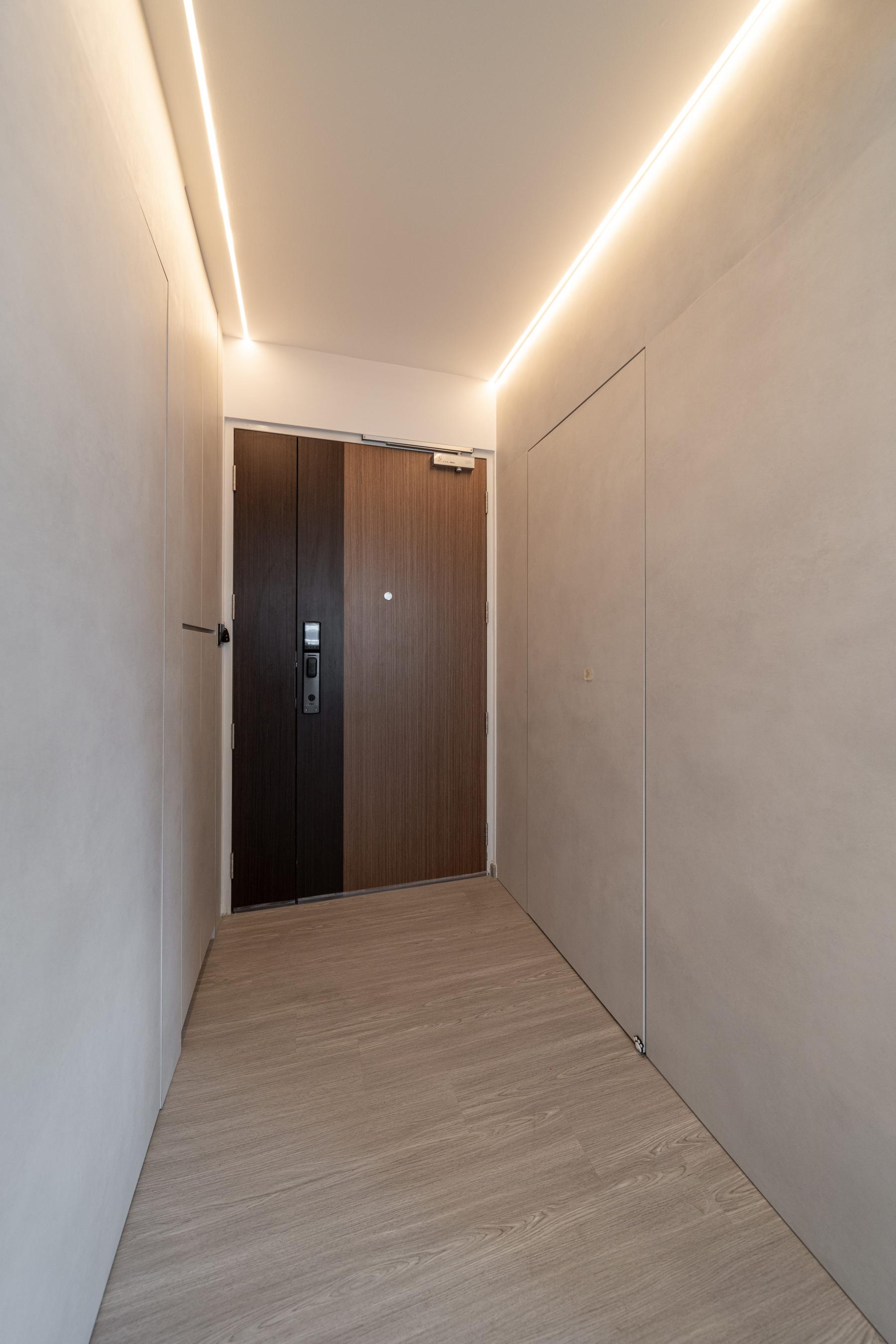 Minimalist Entryway with Vinyl Flooring and Mirror