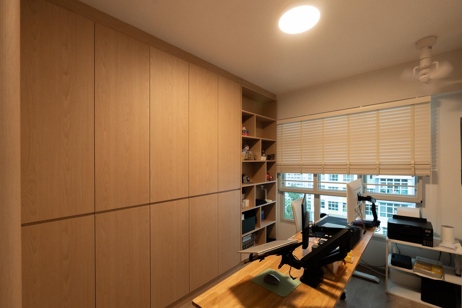 Modern Home Office with Bookshelf and Desk