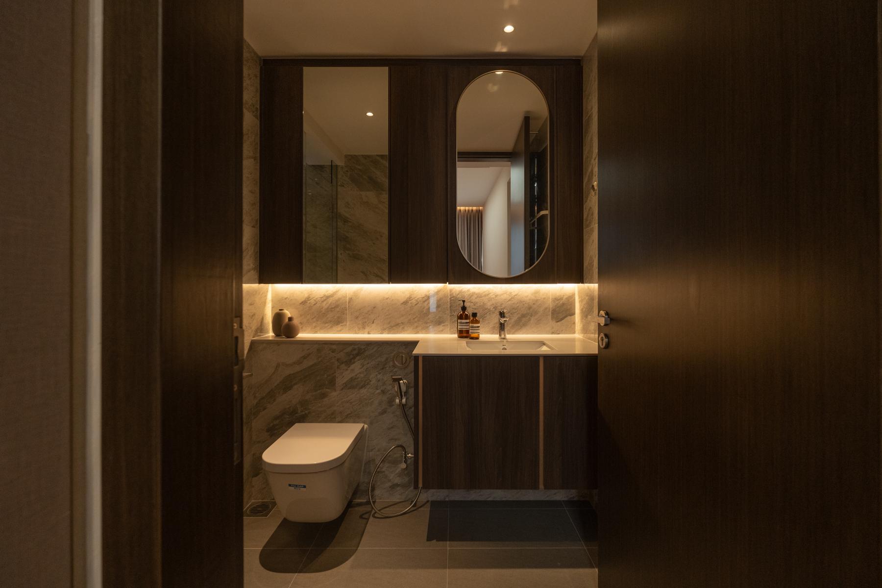 Contemporary Bathroom with Mirror and Laundry Baskets