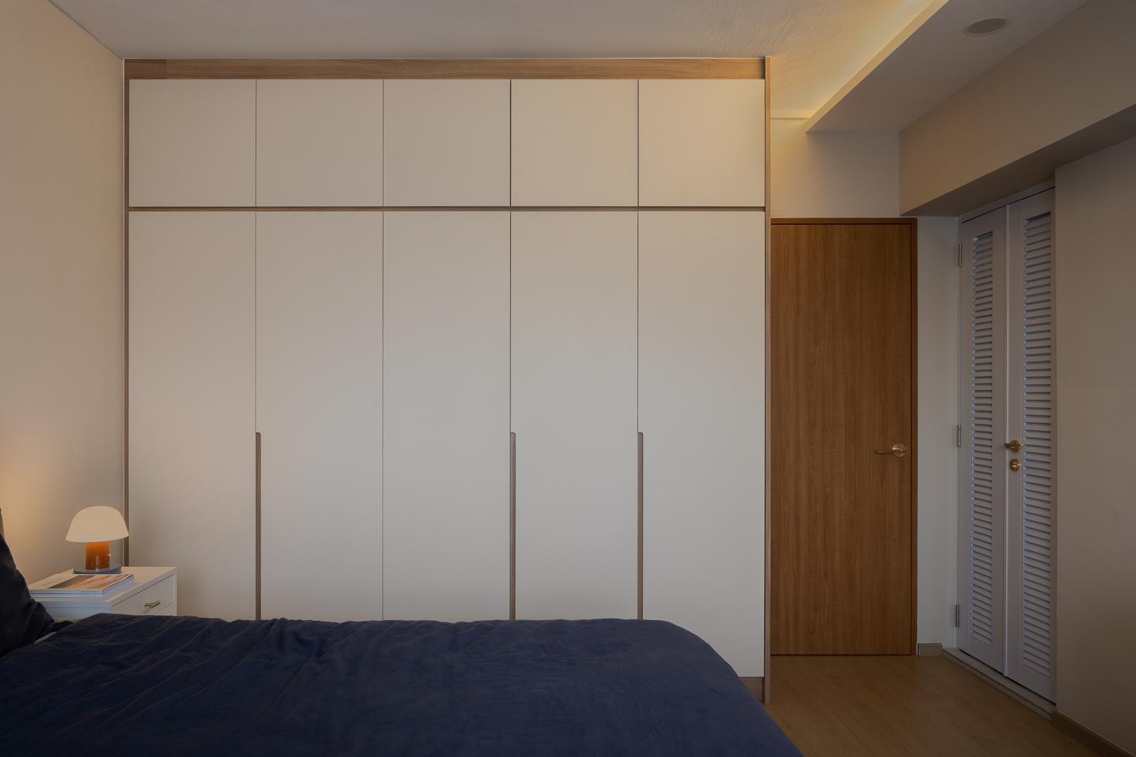Scandinavian Bedroom with Wood Flooring and Cove Lighting