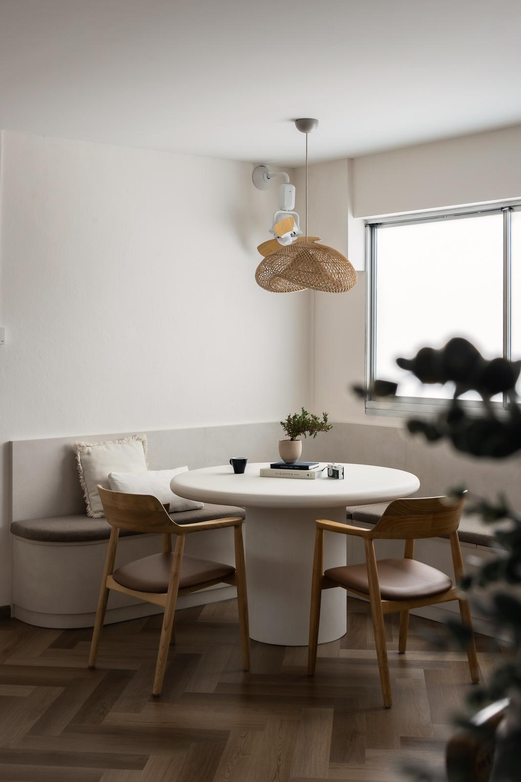 Scandinavian Dining Room with Herringbone Tiling and Wood Flooring