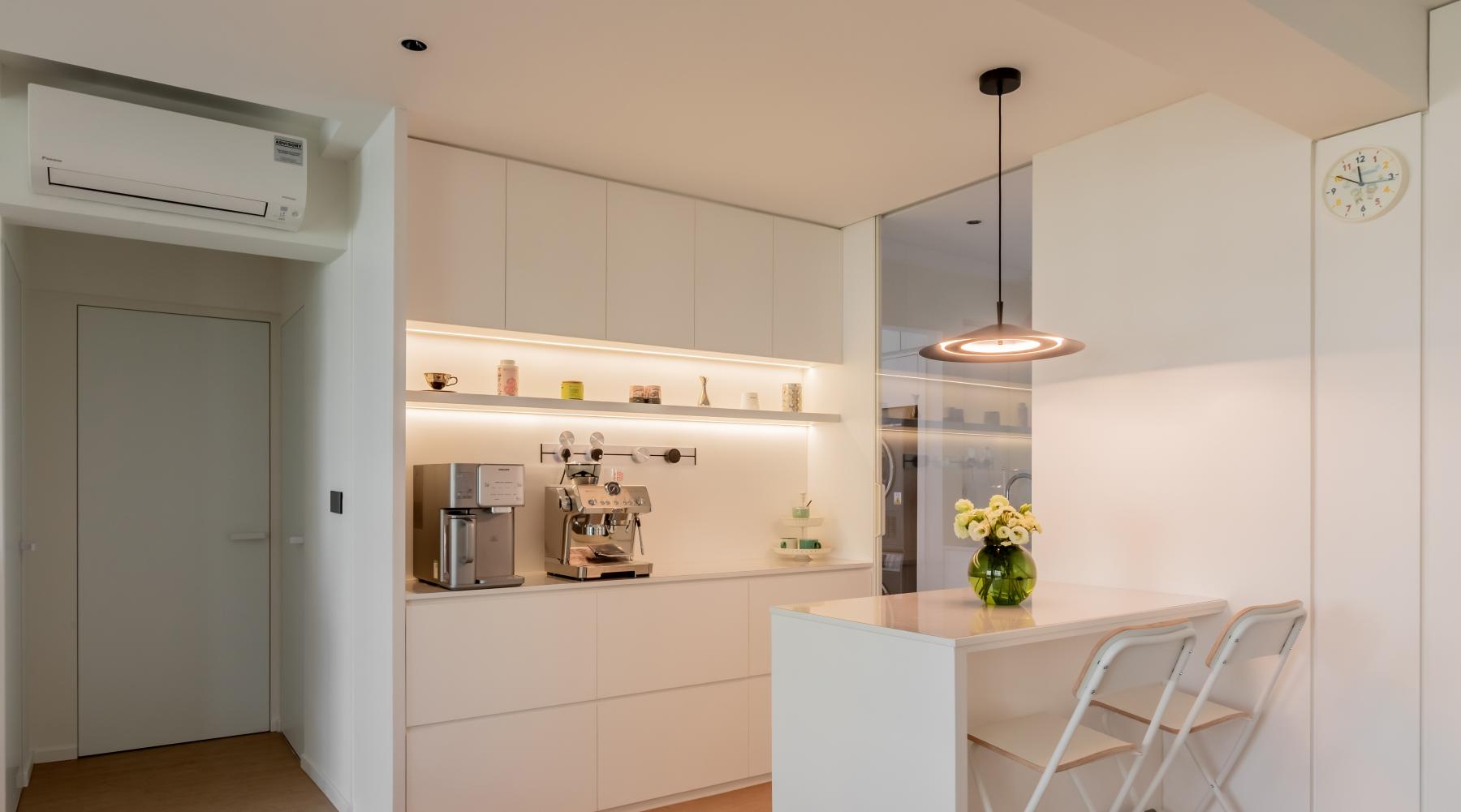 Minimalist Dining Room with Vinyl Flooring and Ceiling Light
