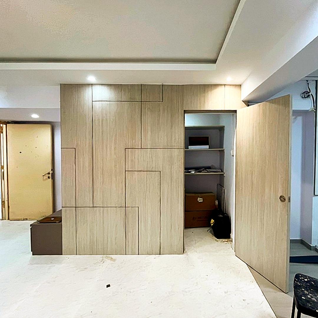 Modern Living Room with Homogeneous Tiles and Feature Wall