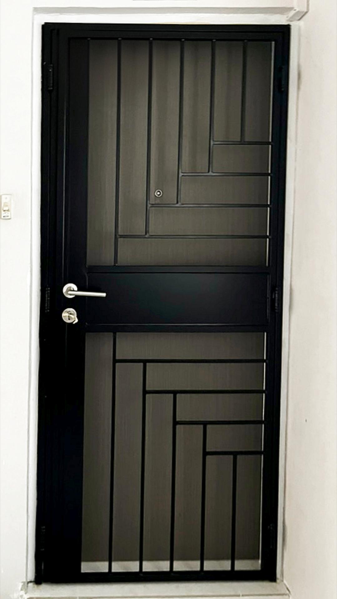 Modern Entryway with Metal Gate and Doors