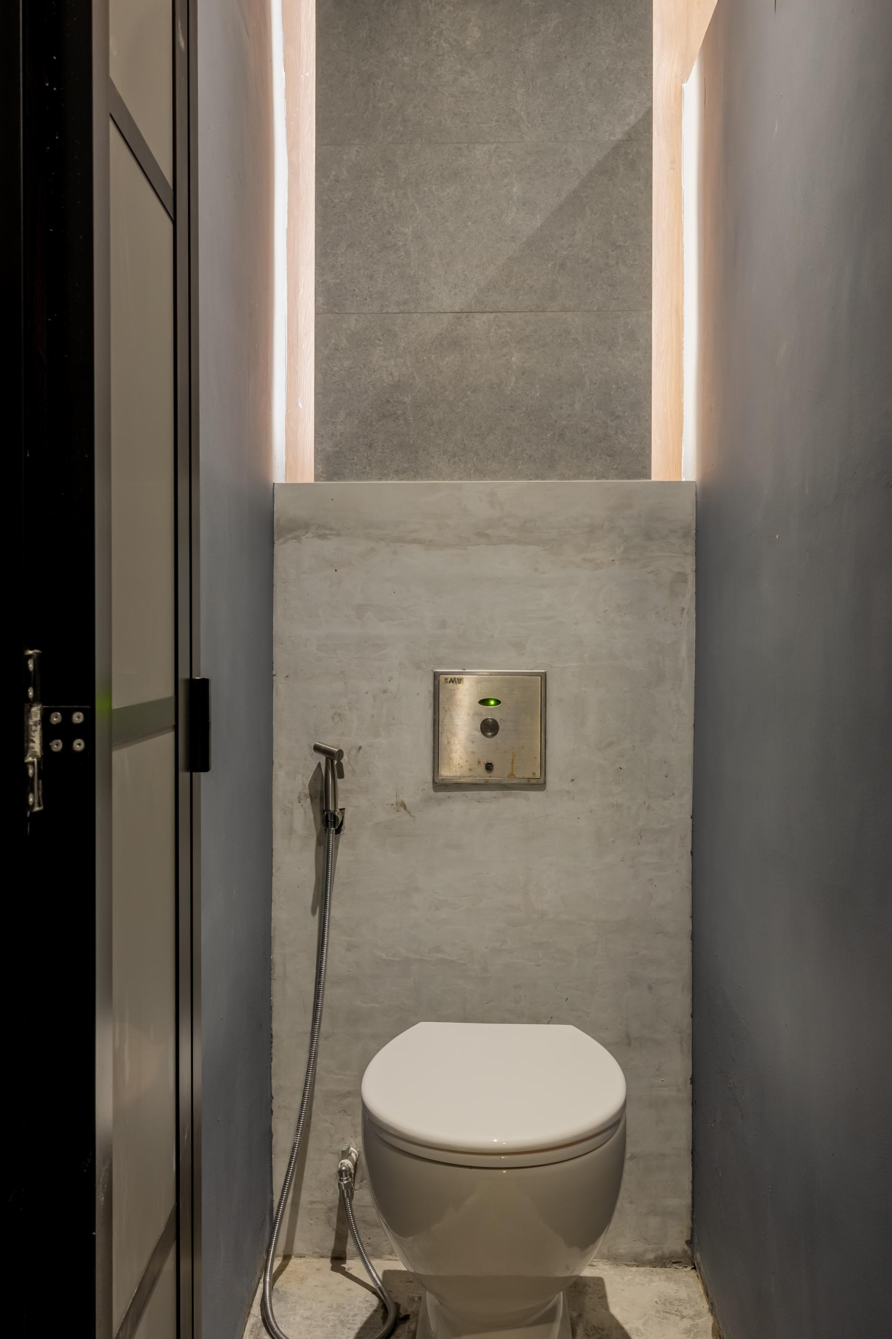 Modern Bathroom with Cement Floor and Bathroom Accessories