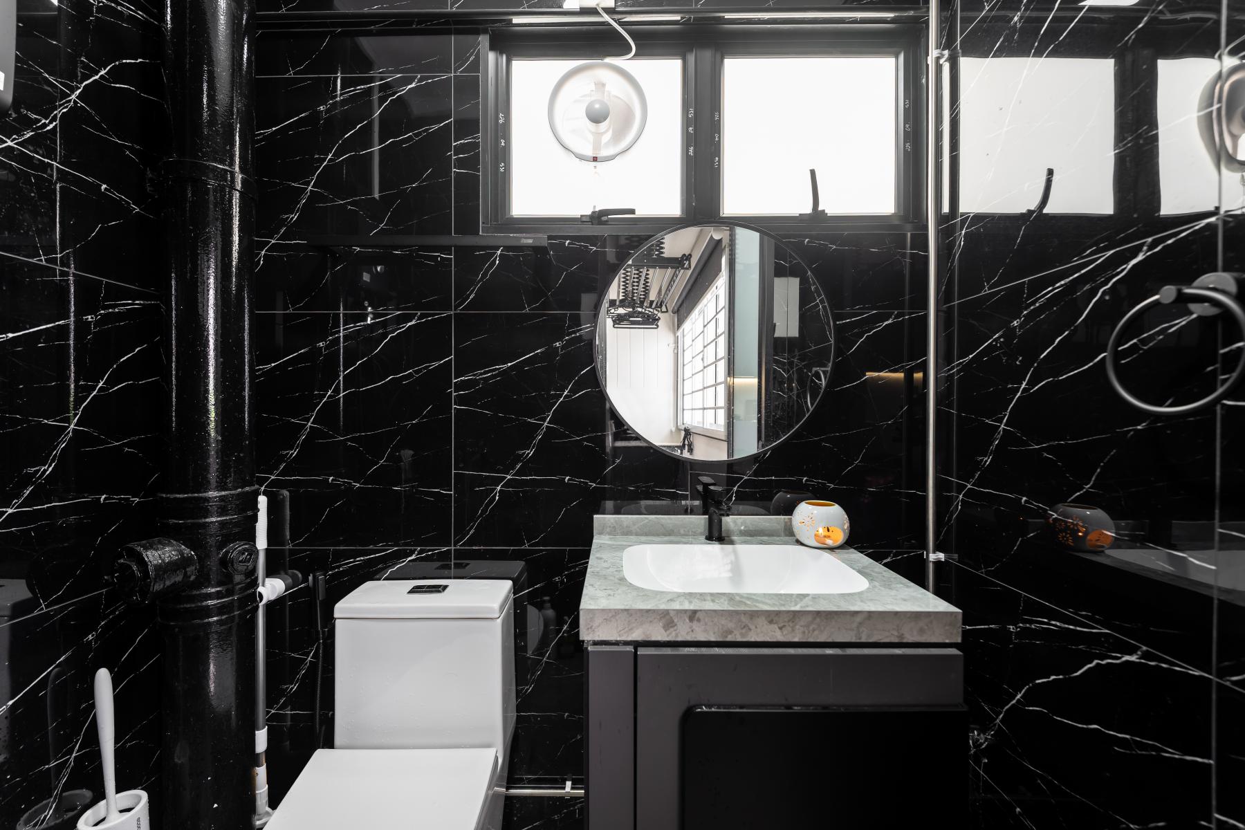 Modern Bathroom with Homogeneous Tiles and Mirror