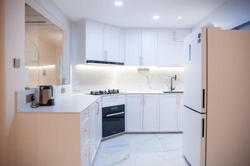 Contemporary Kitchen at Lilydale Condo