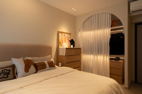 Minimalist Bedroom at Rivervale Shores