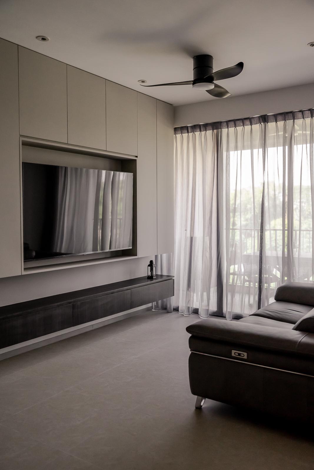 Modern Living Room with Bookshelf and Homogeneous Tiles