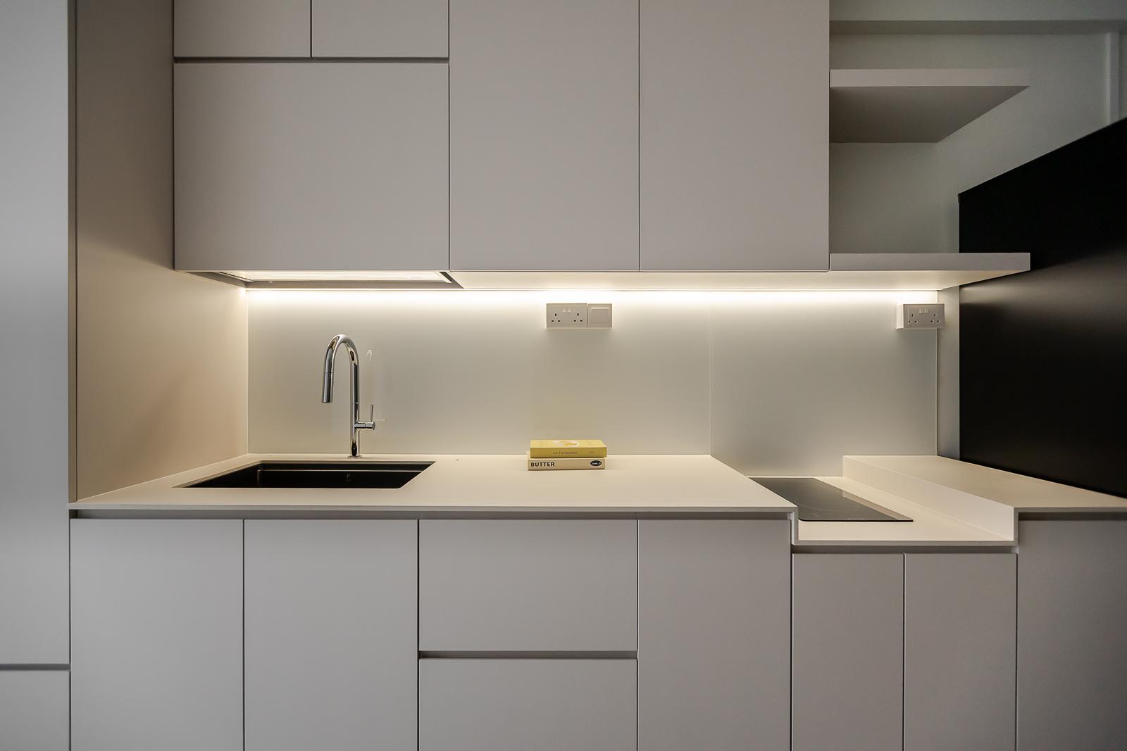 Minimalist Kitchen with Countertop and Homogeneous Tiles