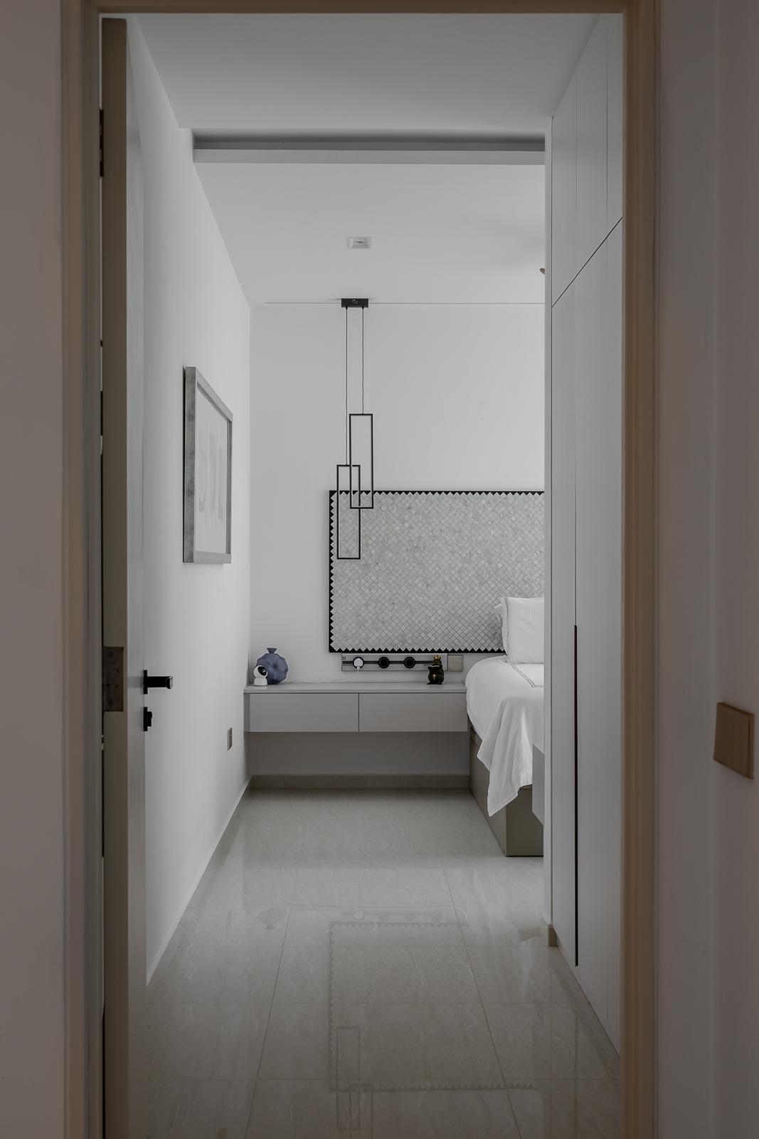 Modern Bedroom with Homogeneous Tiles and Cove Lighting