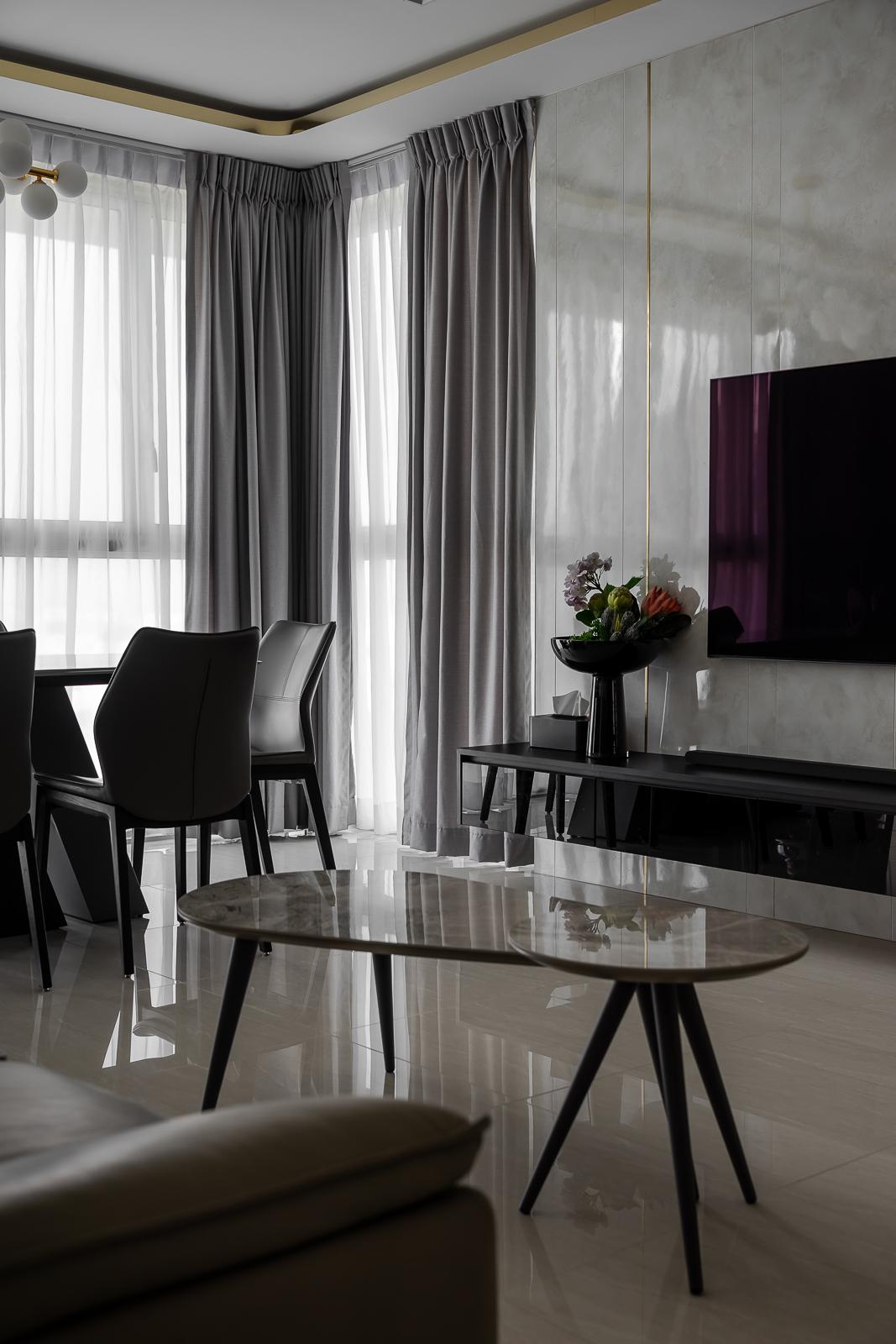 Modern Living Room with Homogeneous Tiles and Feature Wall