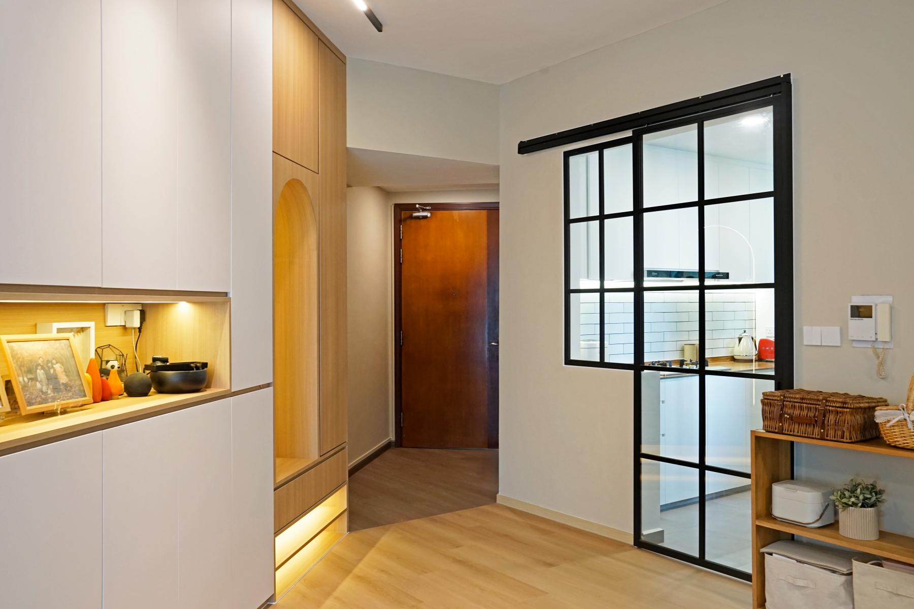 Scandinavian Entryway with Small Storage and Doors