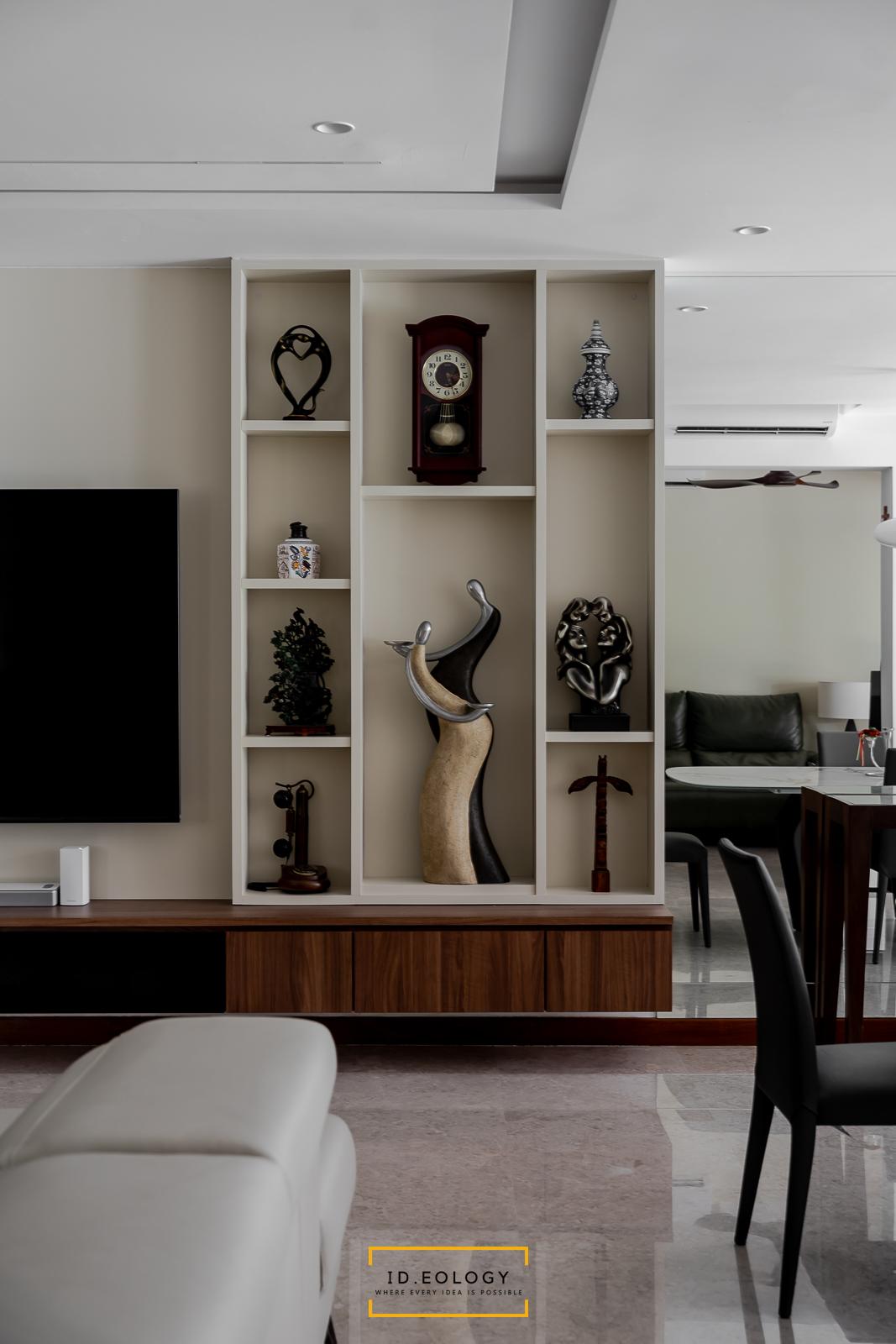 Contemporary Living Room with Cove Lighting and Chandelier