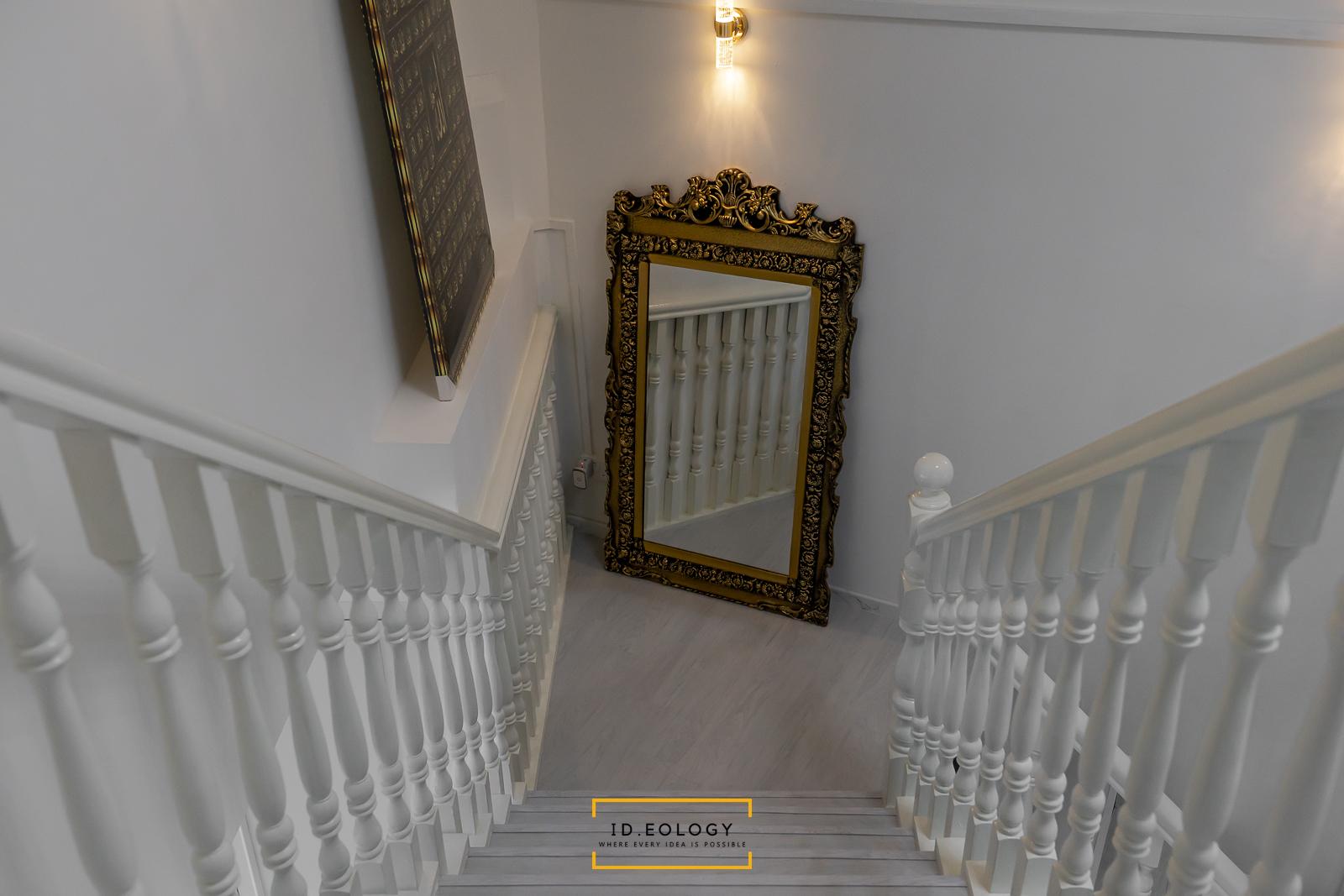 Country Hallway with Bookshelf and Artwork