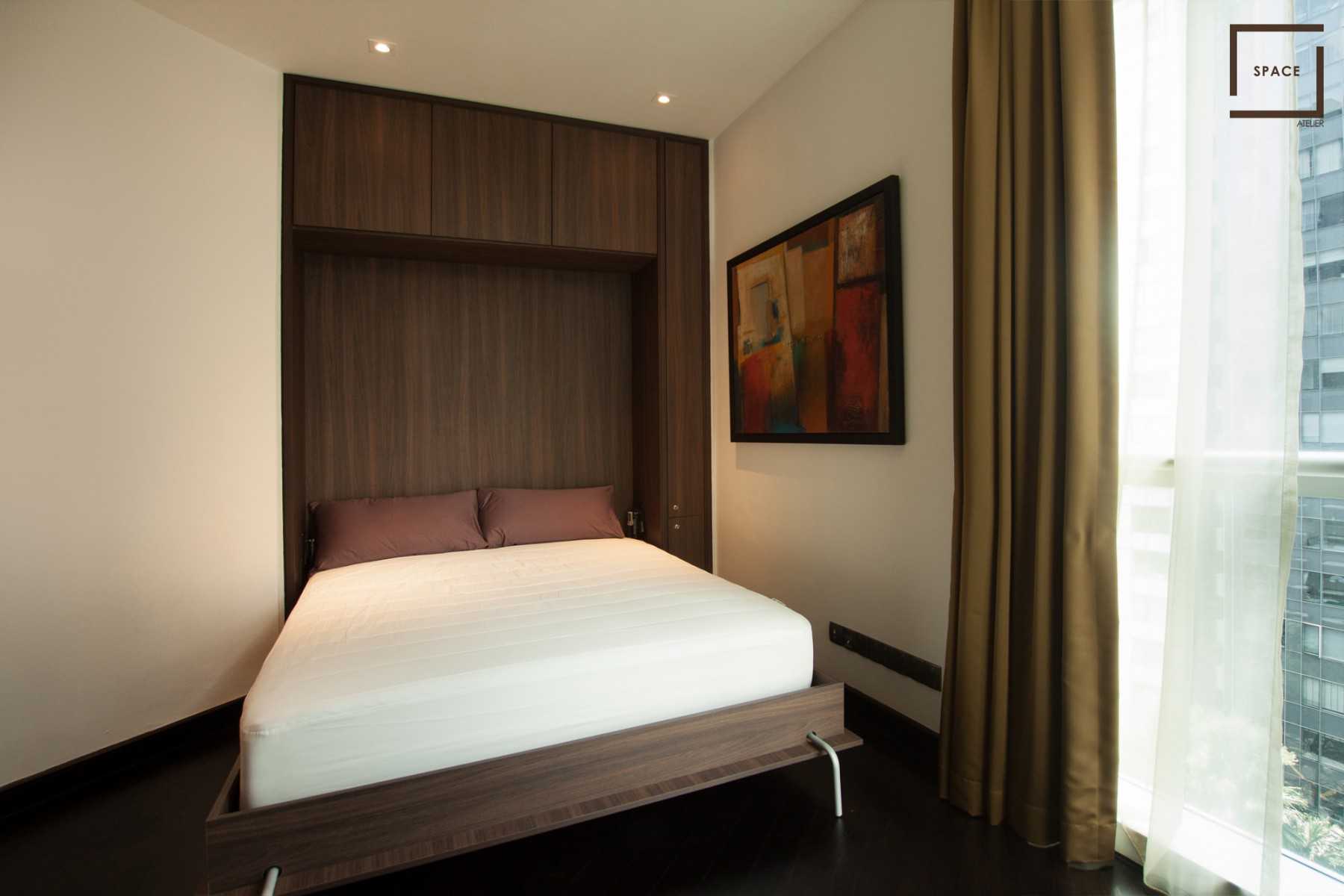 Modern Bedroom with Parquet Floor and Ceiling Light