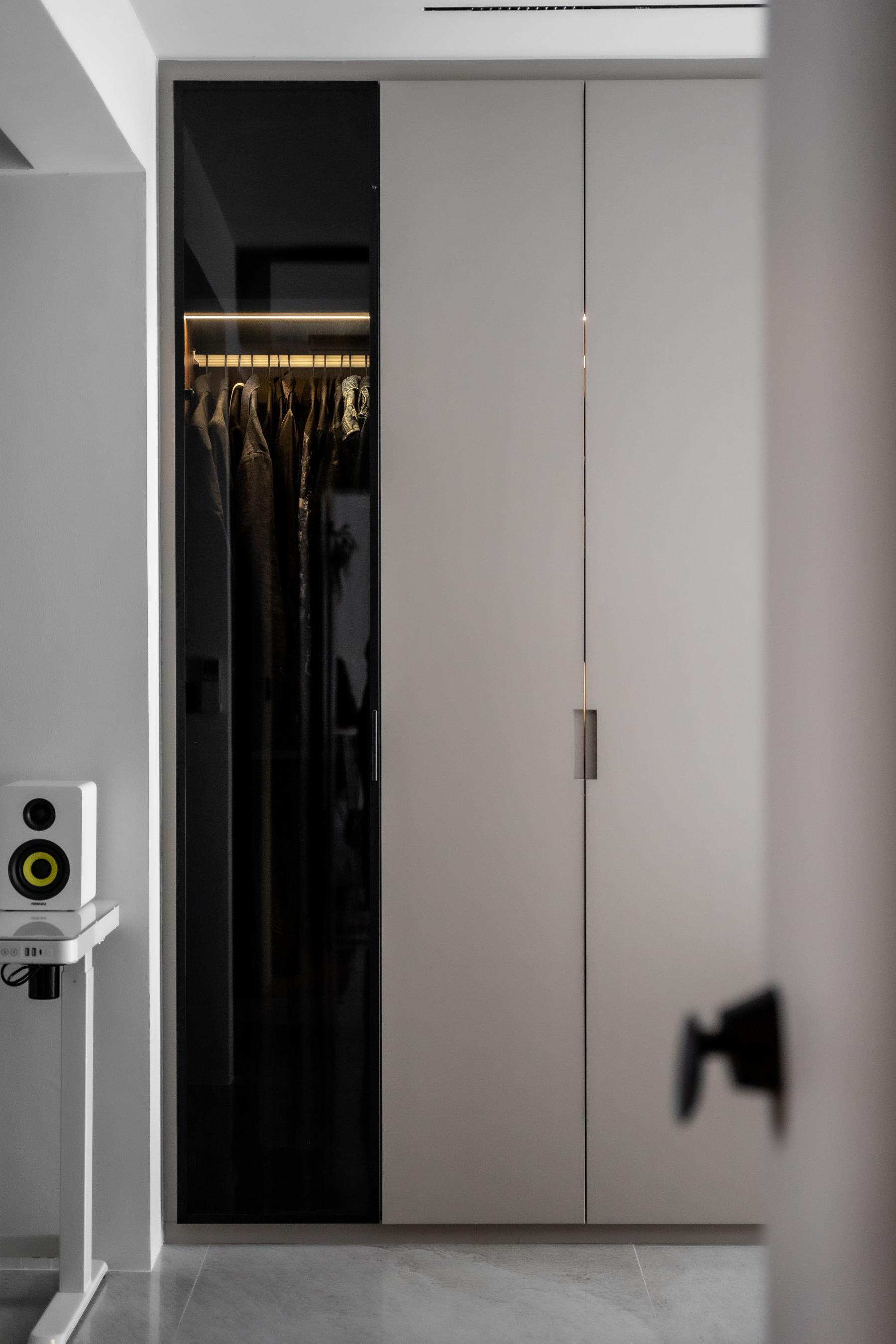 Minimalist Bedroom with Homogeneous Tiles and Wardrobe