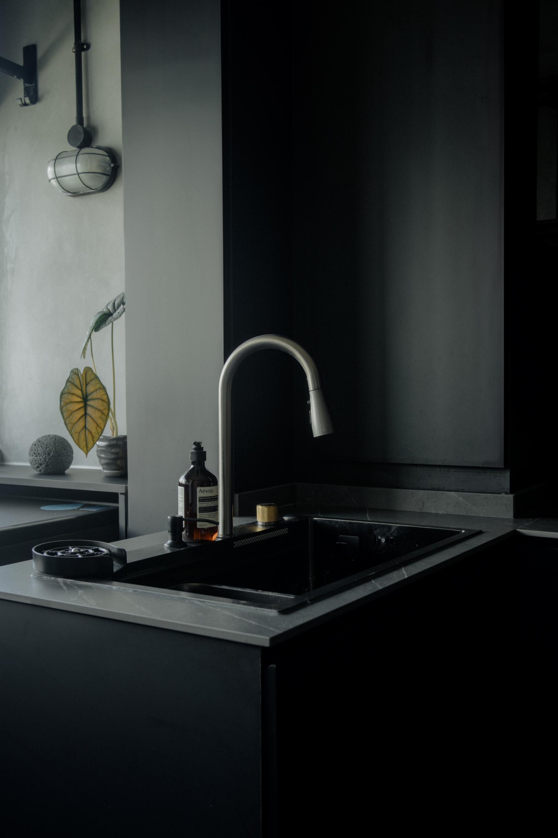 Industrial Kitchen with Herringbone Tiling and Parquet Floor