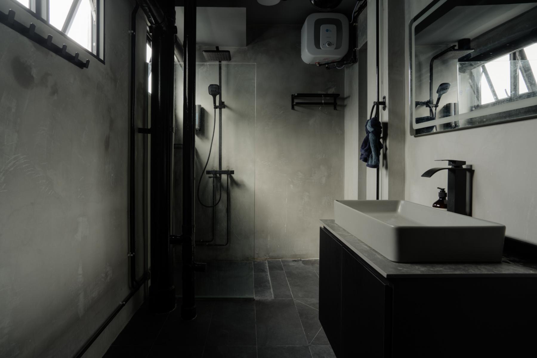 Industrial Bathroom with Herringbone Tiling and Granite Floor