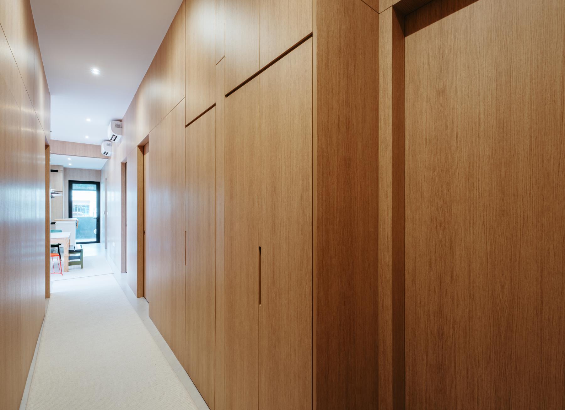 Scandinavian Hallway with Artwork and Paintings
