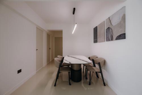 Minimalist Dining Room at Monochromatic Muse