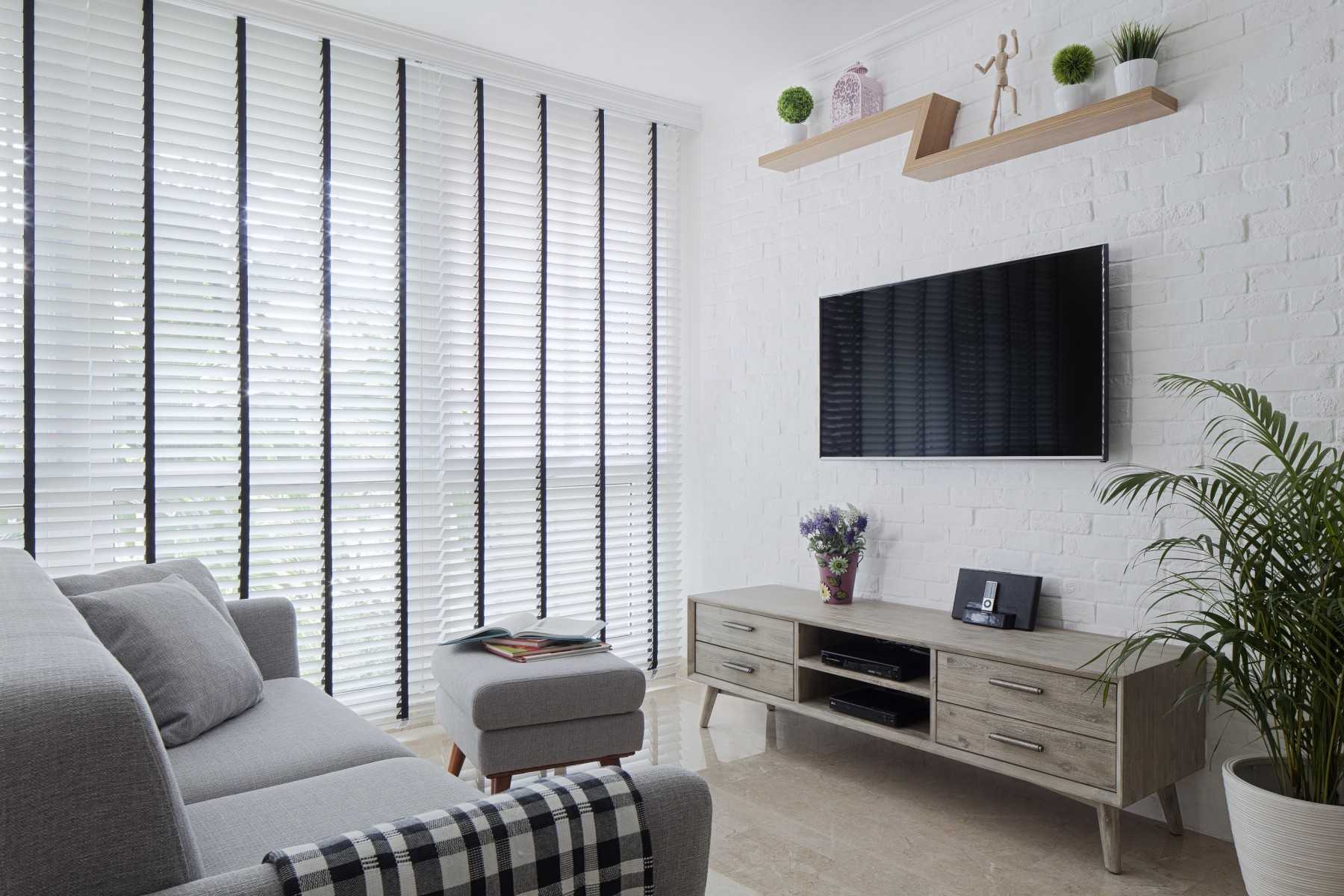 Minimalist Living Room with TV Console and Feature Wall