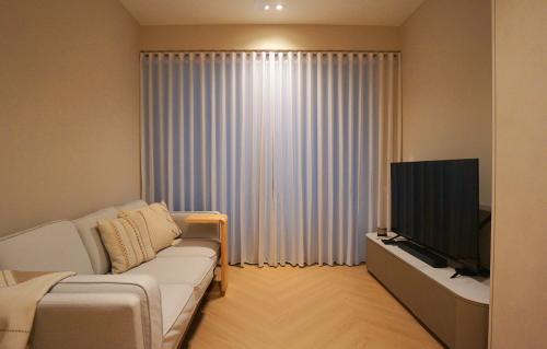 Scandinavian Living Room at Glades Condo