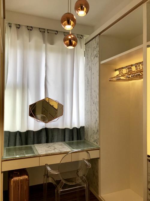Minimalist Walk-in Wardrobe at Brownstone Condo