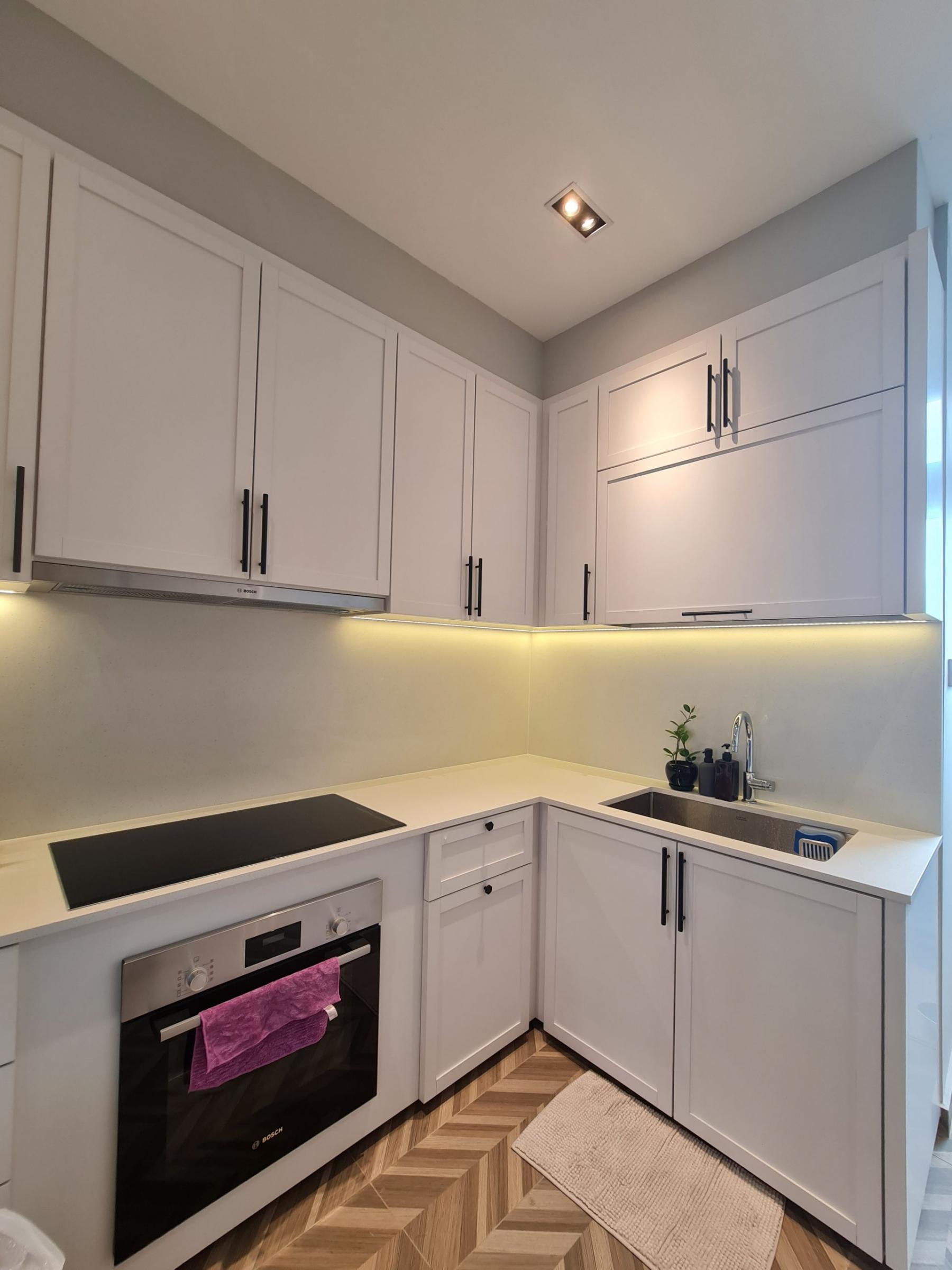 Vintage Kitchen with Countertop and Kitchen Backsplash