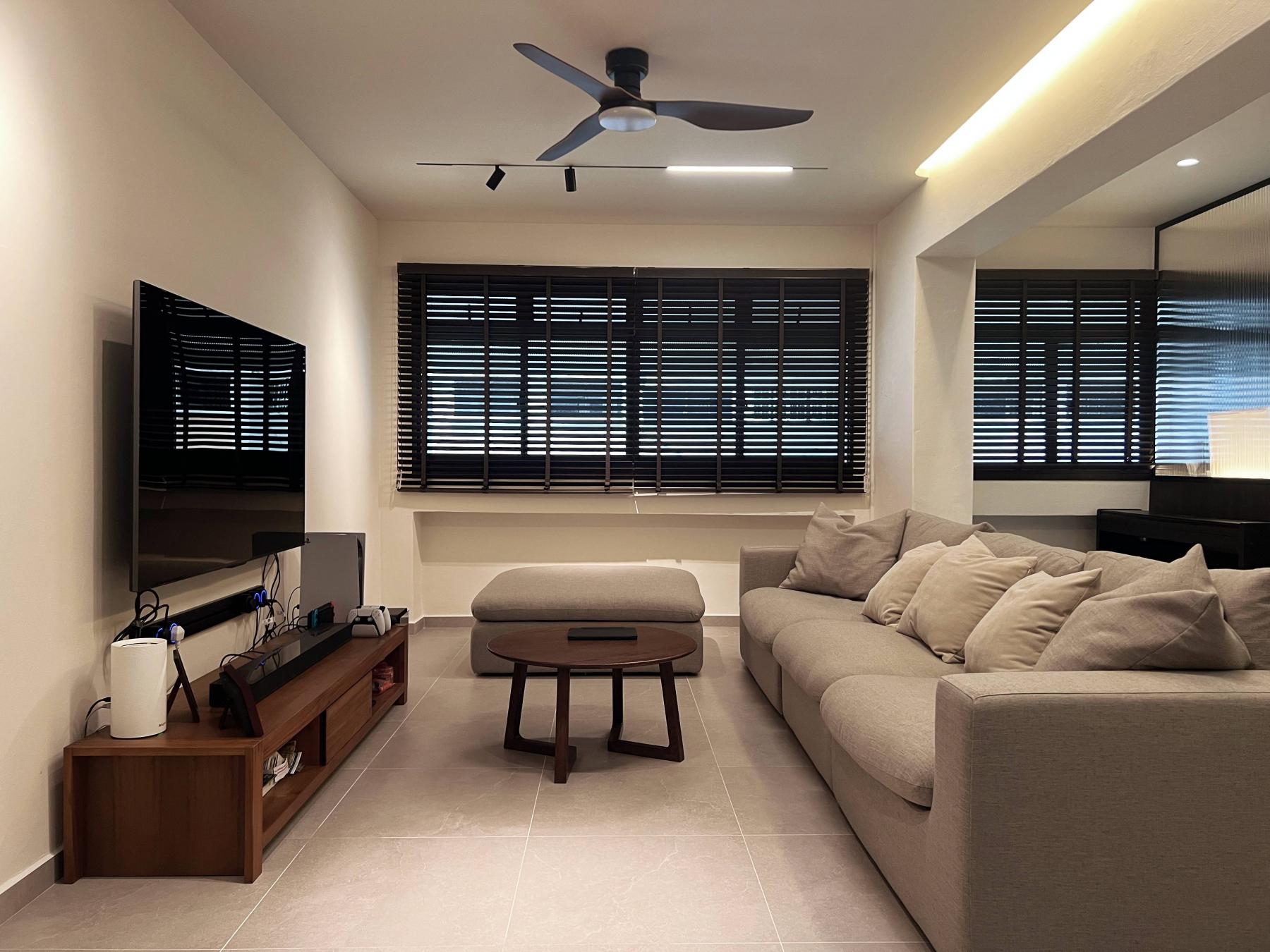 Modern Living Room with Homogeneous Tiles and Cove Lighting