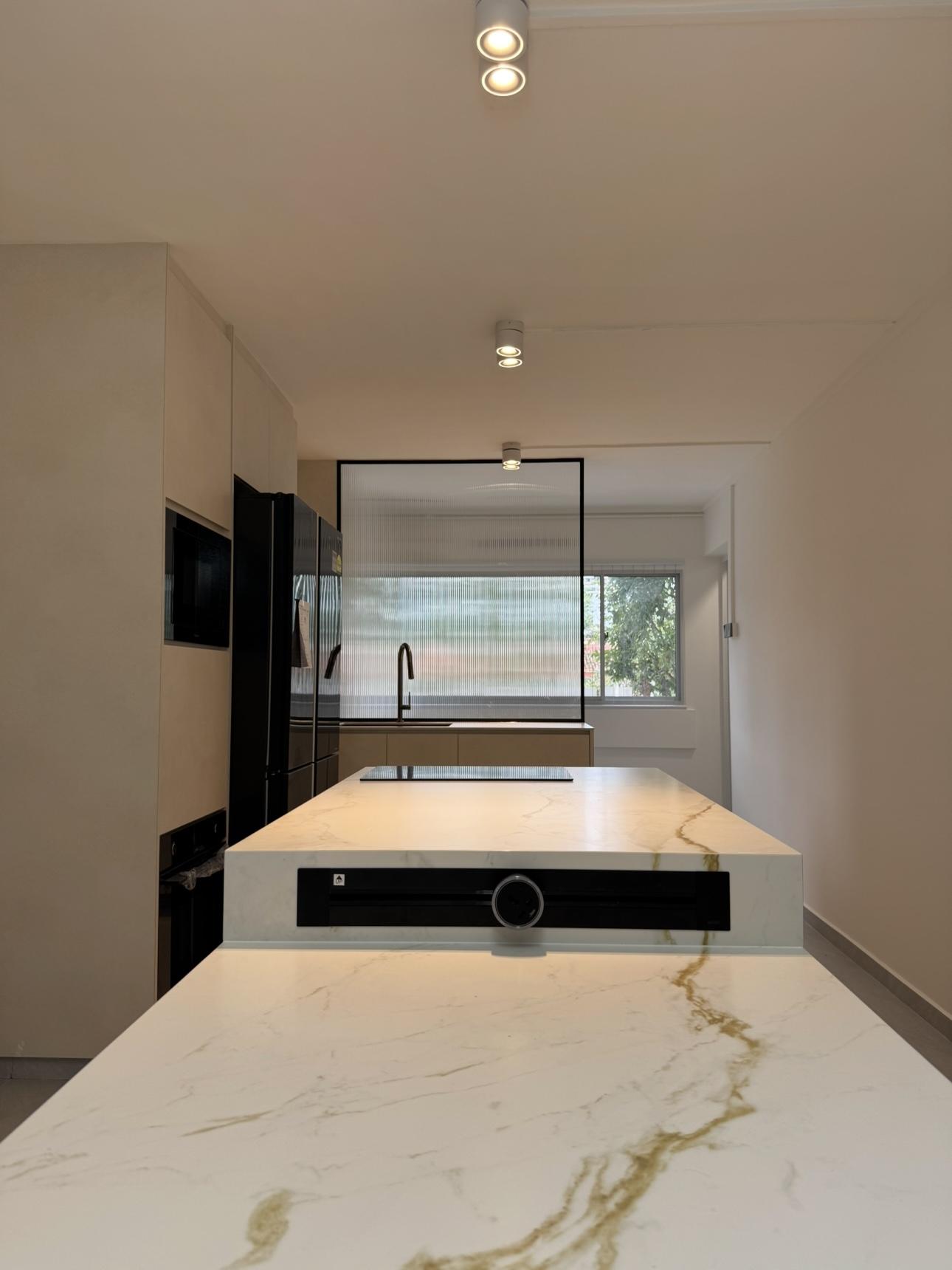 Minimalist Kitchen with Countertop and Homogeneous Tiles