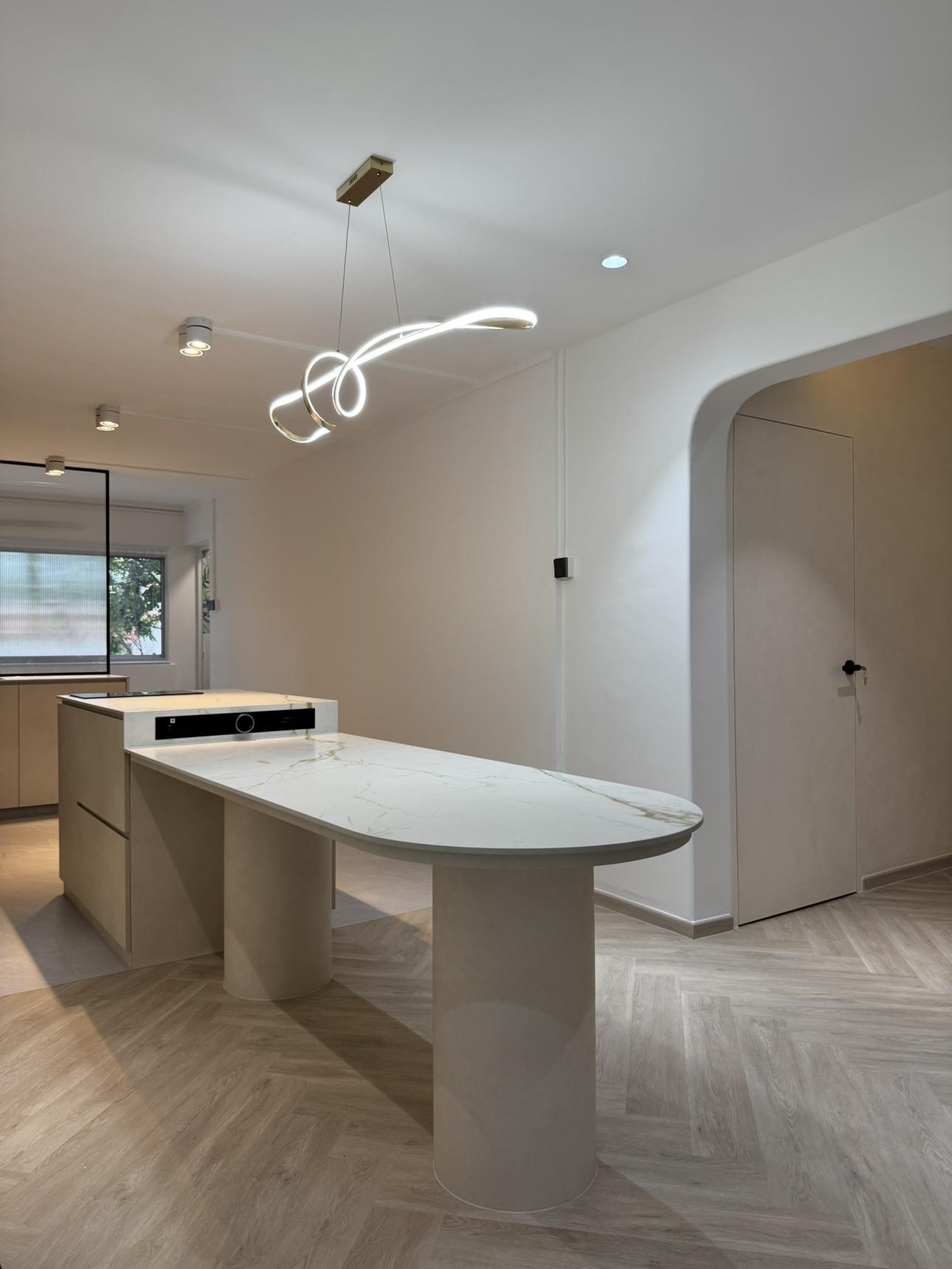 Minimalist Dining Room with Drop Light and Ceiling Light