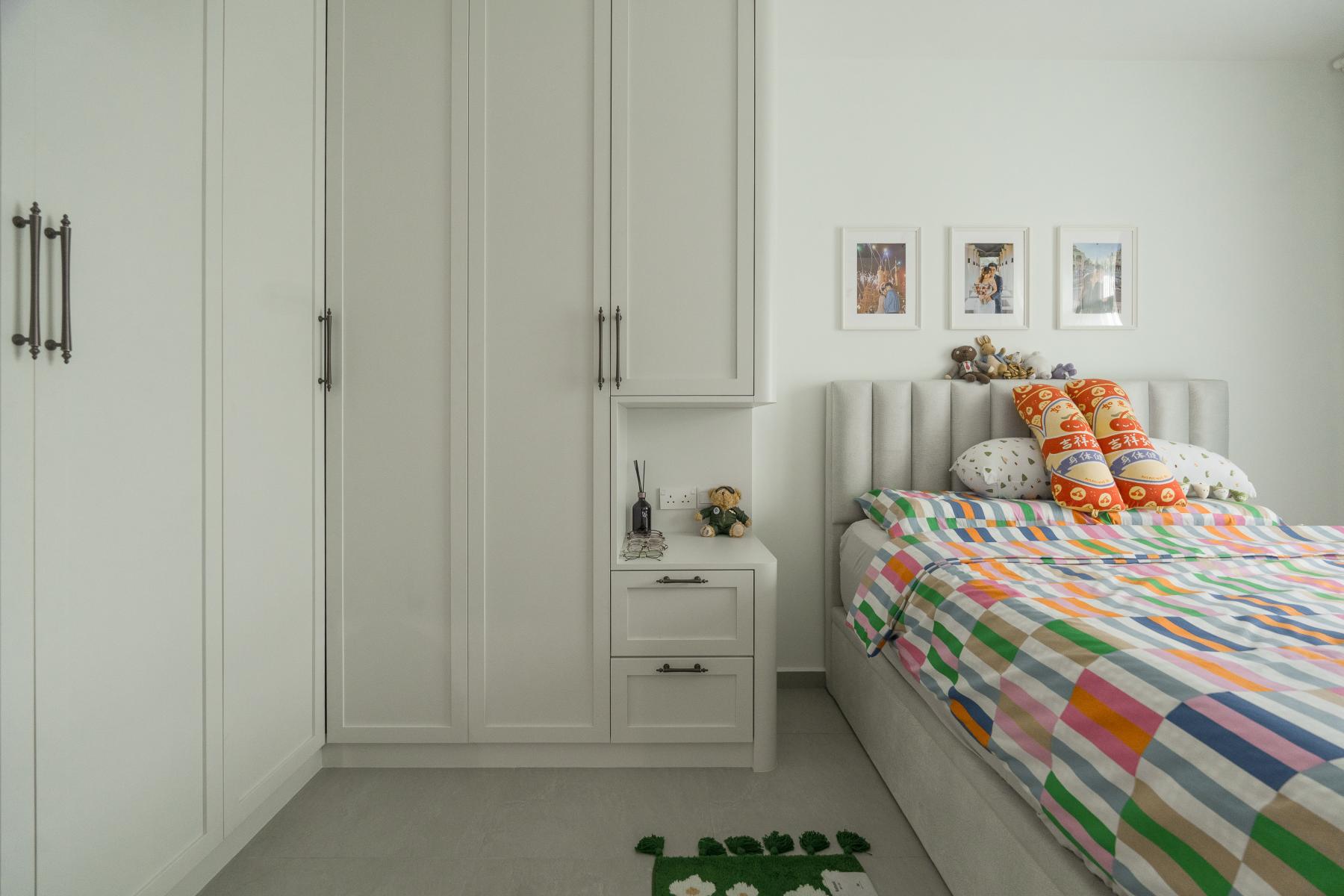 Eclectic Bedroom with Wood Flooring and Bay Window