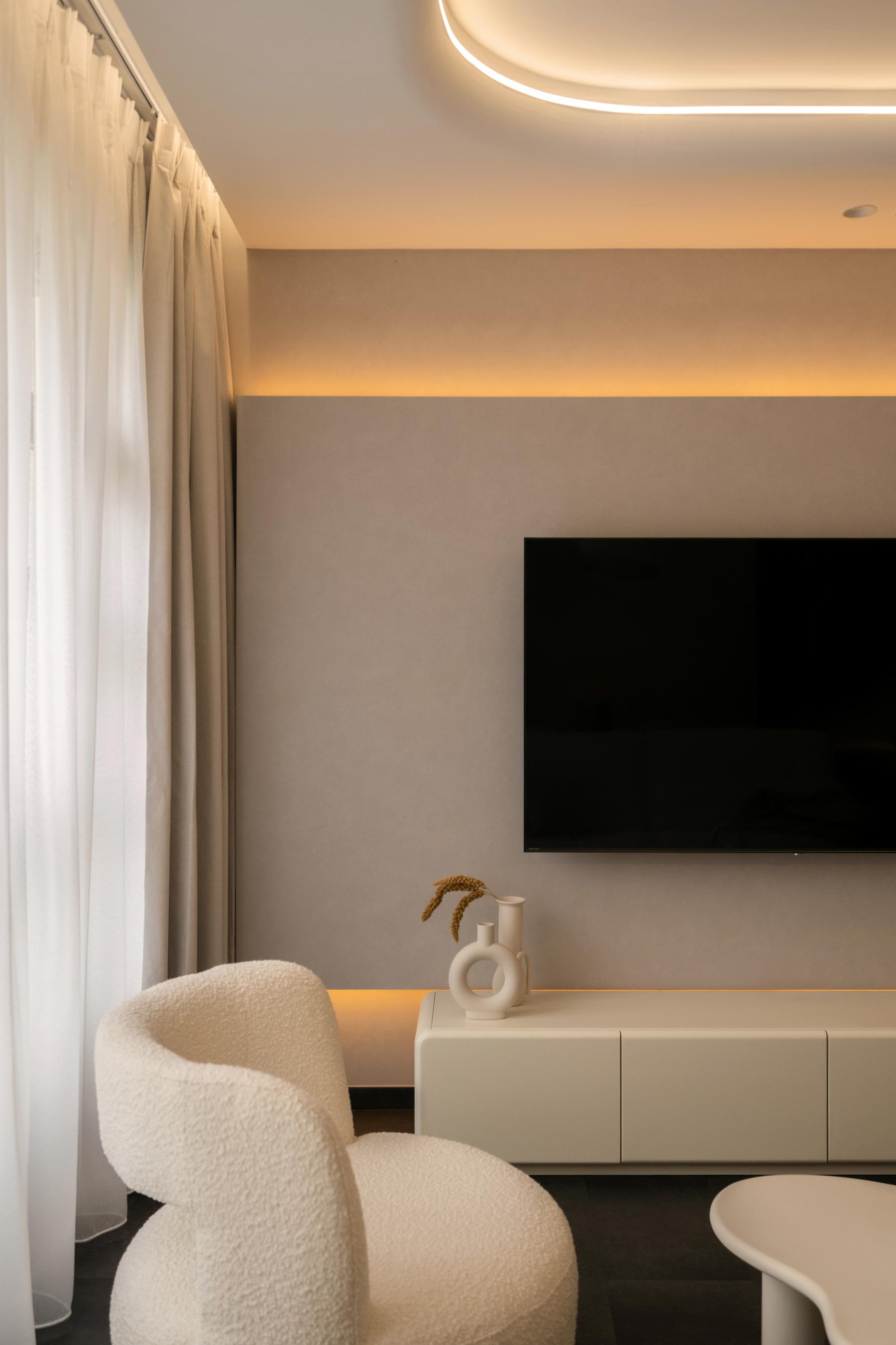 Contemporary Living Room with TV Console and Cove Lighting