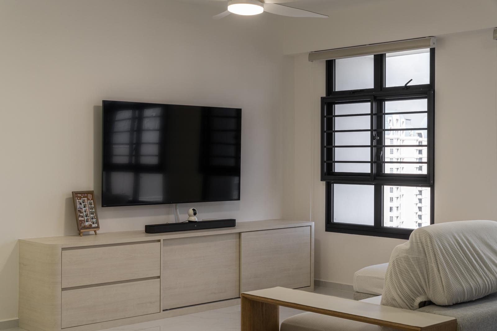 Minimalist Living Room with Homogeneous Tiles and TV Console