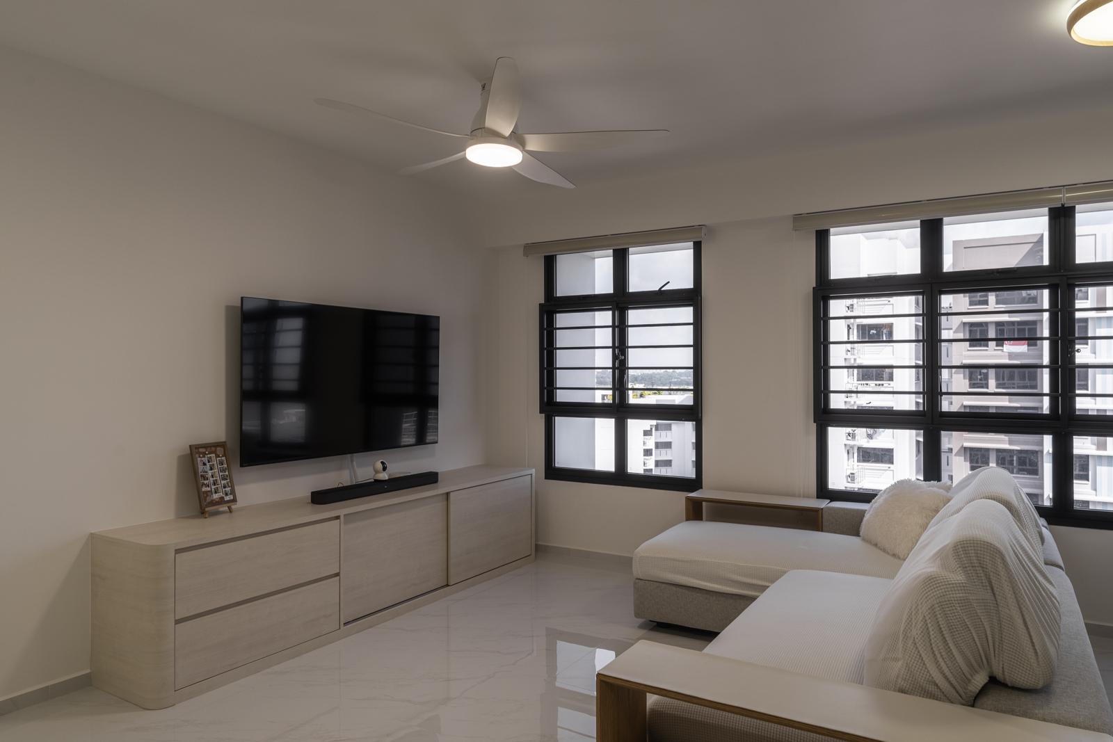 Minimalist Living Room with Homogeneous Tiles and TV Console